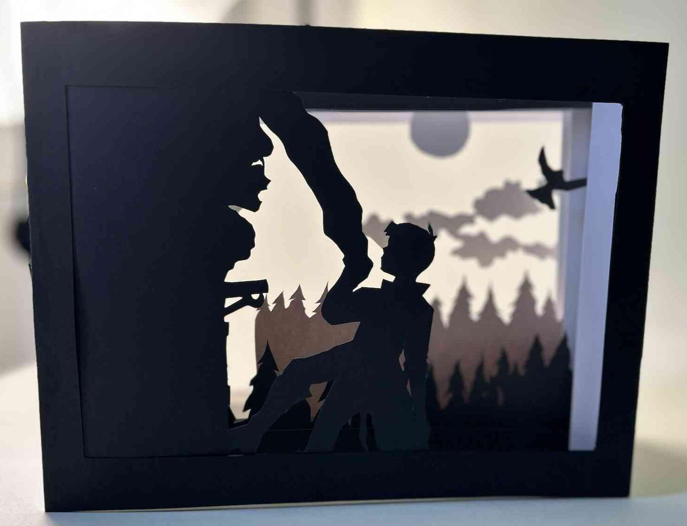 A tunnelbook depicting a scene from Rapunzel, by the Brothers Grimm.